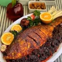 دلال ماهی با رب انار ملس و سبزی های معطر محلی شمال در بسته بندی وکیوم 250  گرمی