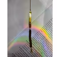 دسبند حدید پیکانی طلایی و مروارید تمام استیل