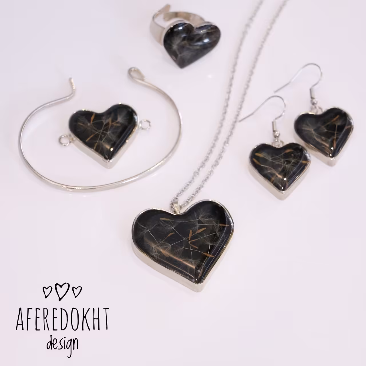 سرویس استیل نقره ای قاصدک با زمینه مشکی