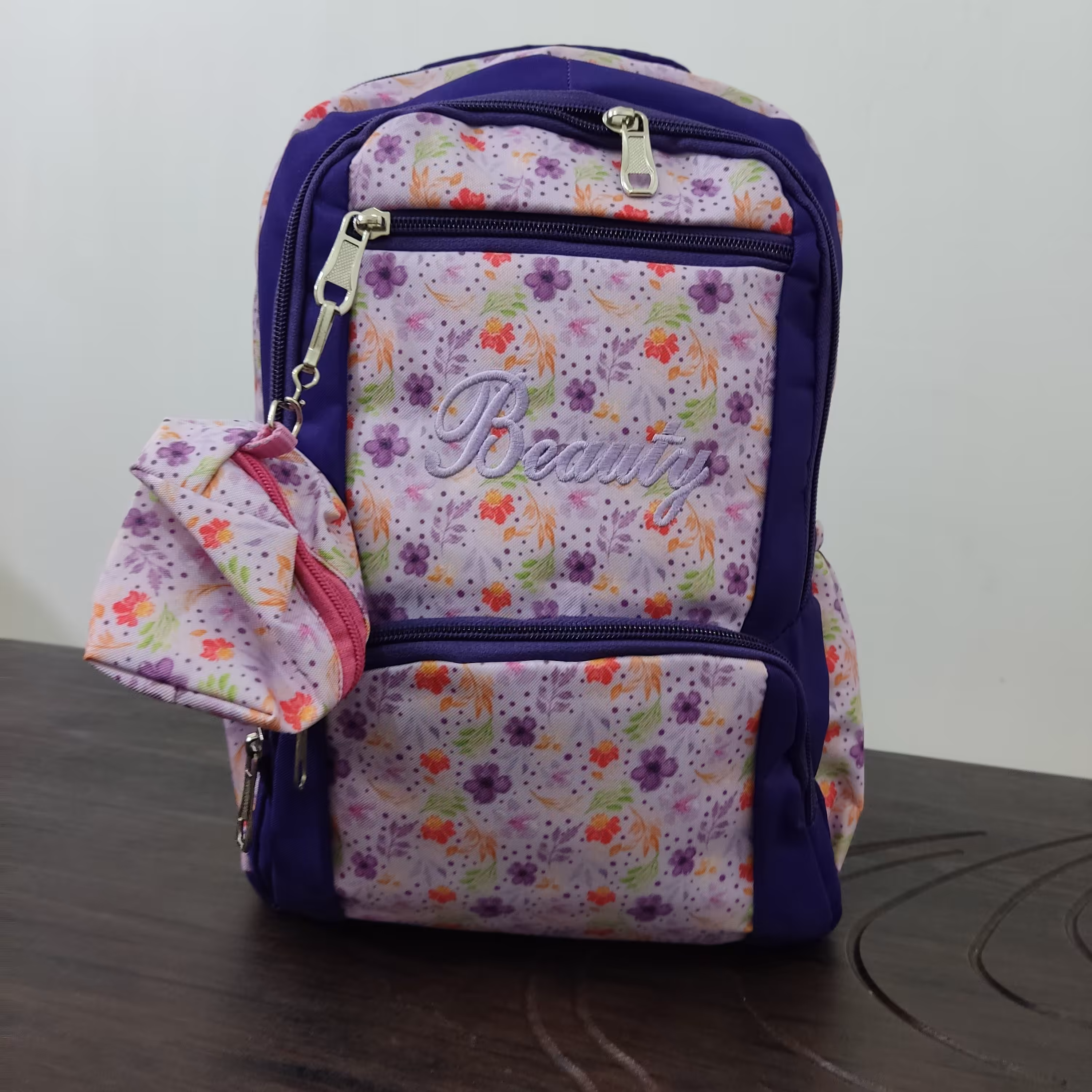 کوله پشتی دخترانه برزنتی دبستان طرح گل بنفش کدm22
