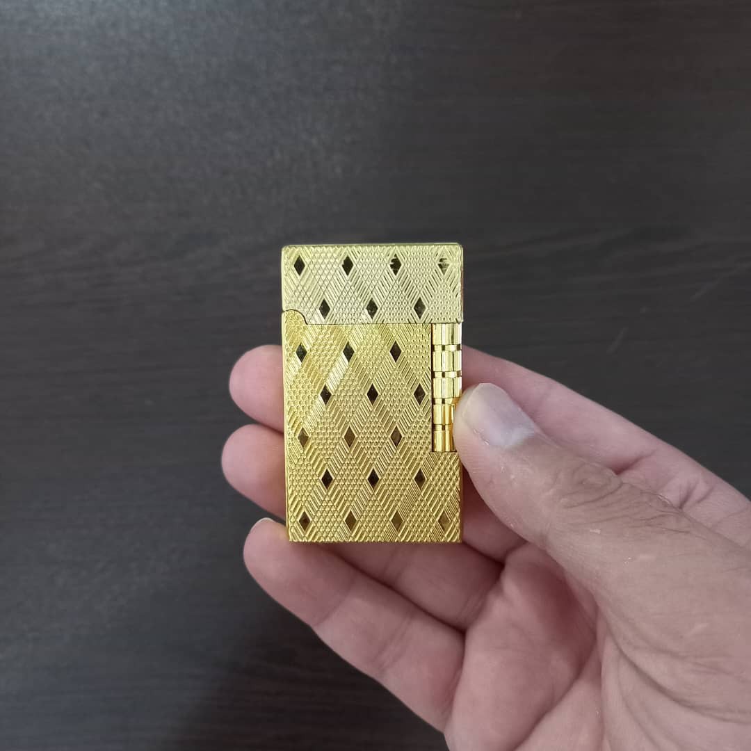 فندک روکش طلا همراه با جعبه و شناسنامه اصالت کالا