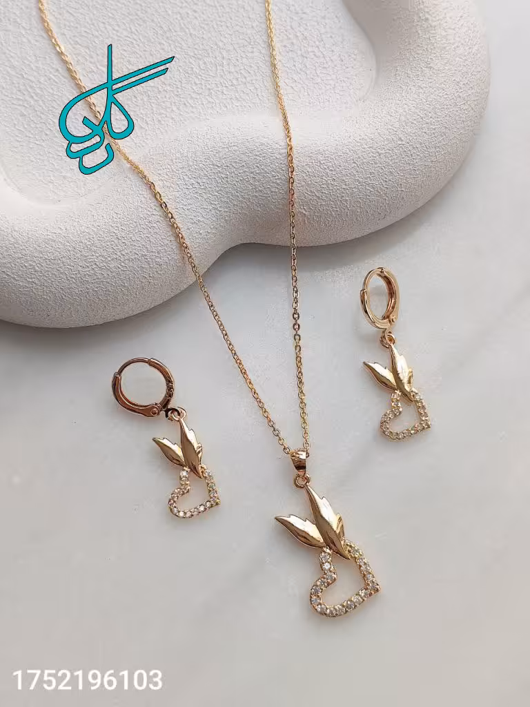 خرید نیمست زنانه جدید طلایی طرح قلب نگین دار مارک ‏ysx رنگ ثابت کیفیت عالی همراه با زنجیر کد 1715518 - ردگل