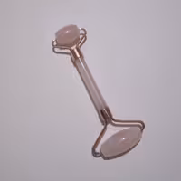 ماساژور صورت بانوان و آقایان دارای سه قطعه سنگ رز کوارتز اصل و طبیعی