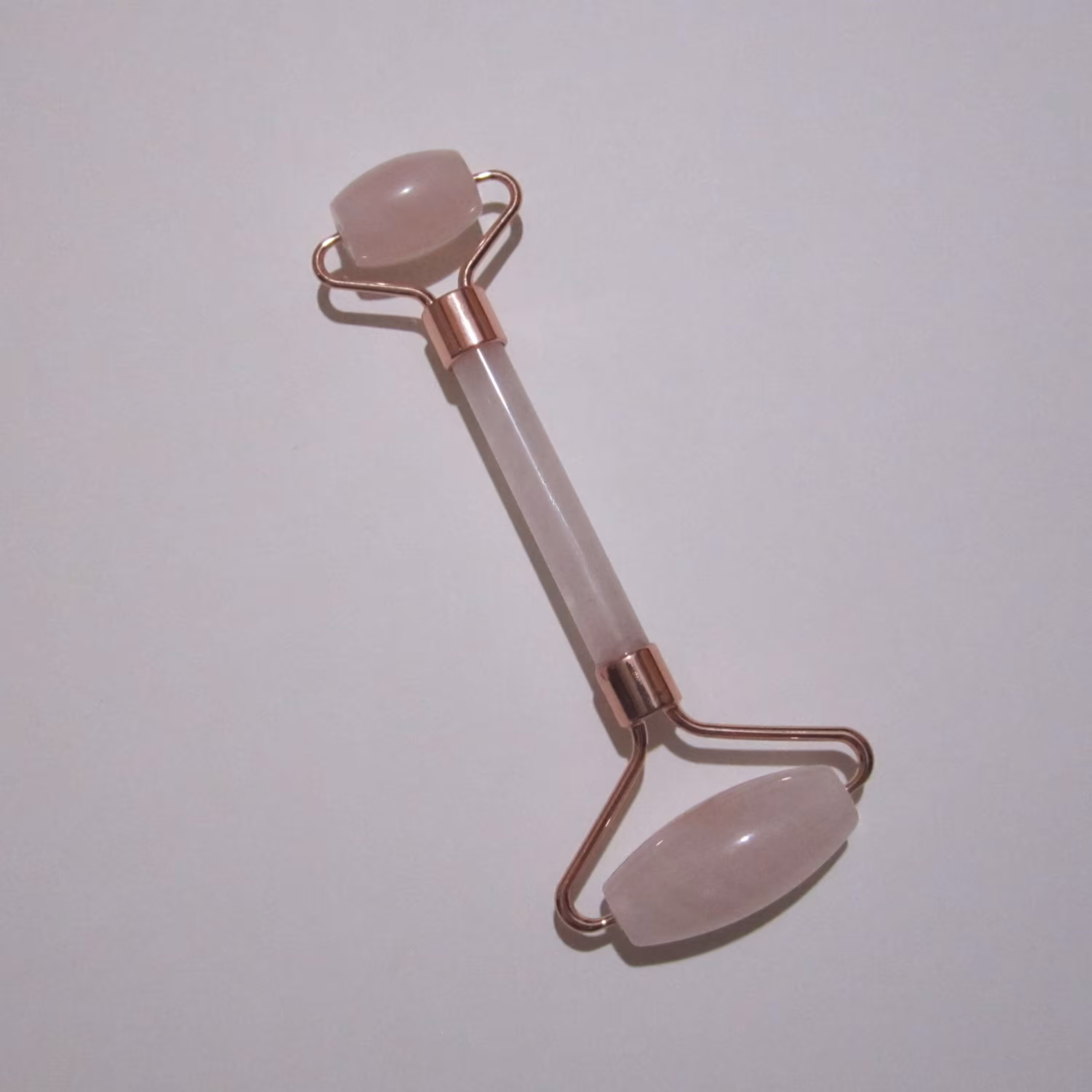 ماساژور صورت بانوان و آقایان دارای سه قطعه سنگ رز کوارتز اصل و طبیعی