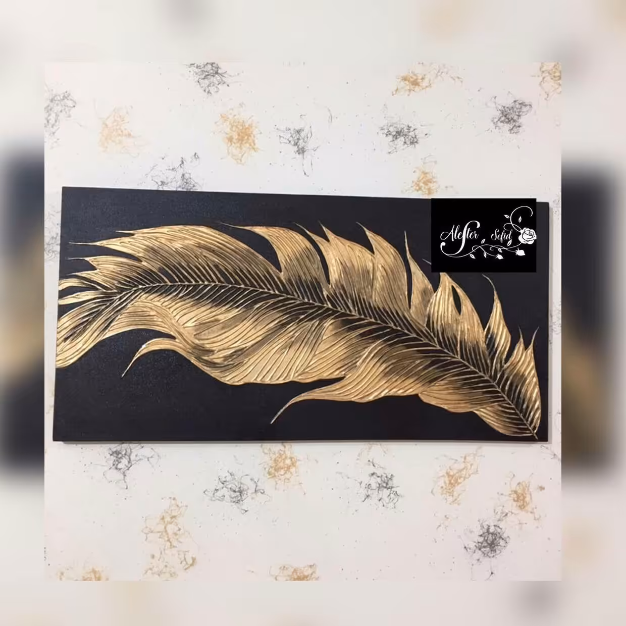 تابلو دکوراتیو،نقاشی برجسته ،کار شده با ورق طلا،طرح پر ، پس کرایه