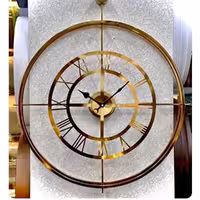 ساعت دیواری فلزی خاص(طلایی و نقره ای)