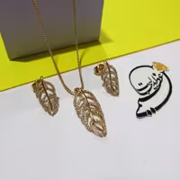 نیم ست برند Xuping از جنس مس و روکش طلا بسیار با کیفیت طرح برگ و نگین کاری شده ظریف کاملا مشابه طلا