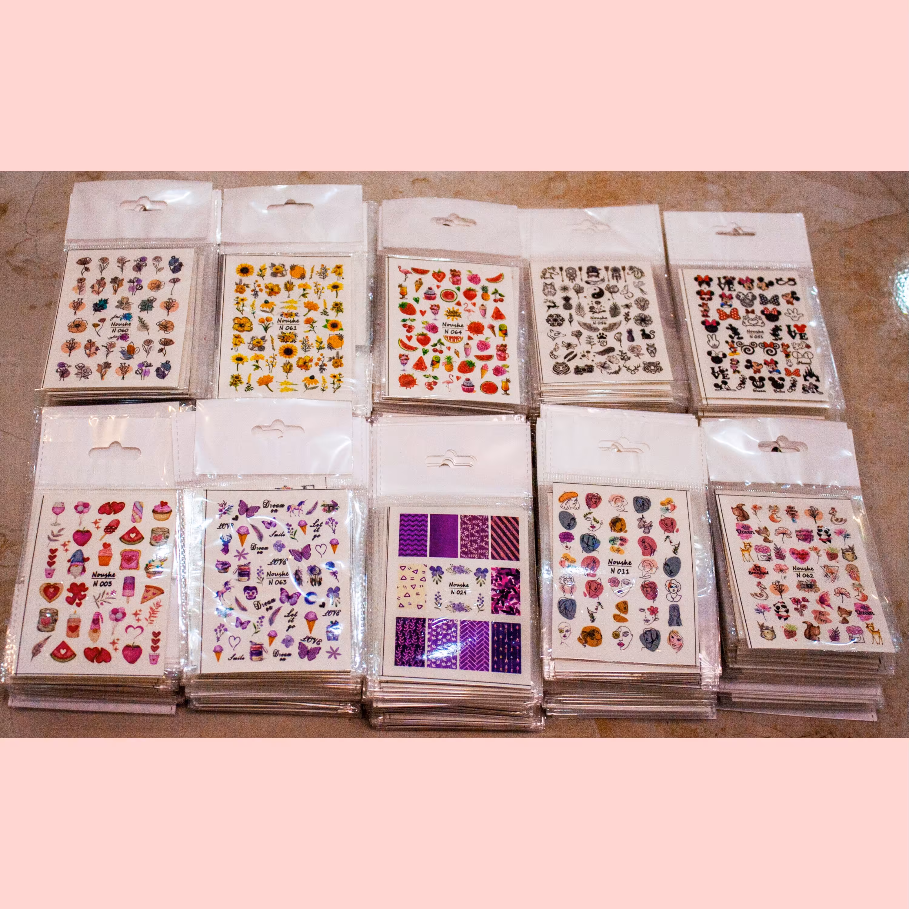 لنز ناخن نوشه مجموعه 100 عددی فروش عمده به انتخاب شما