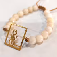 دستبند ،بافت کشویی،قابلیت تنظیم سایز،پلاک استیل و رنگ ثابت،سنک با رنگ ثابت