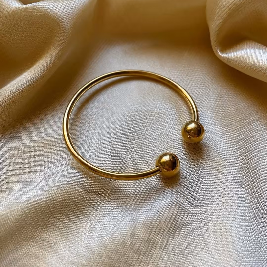 بنگل مدل گوی طلایی استیل رنگ ثابت