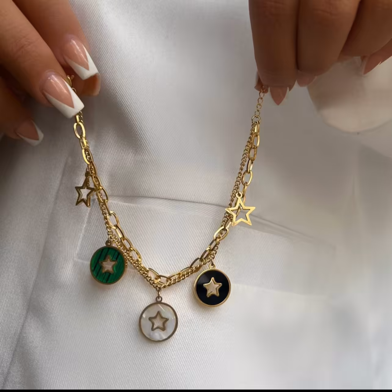 ارسال رایگان دستبند استیل آویزدار ستاره ای