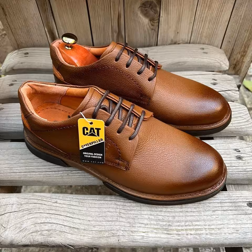 کفش طبی تمام چرم مدل کاترپیلار با زیره لاستیک در دو رنگ مشکی و عسلی 