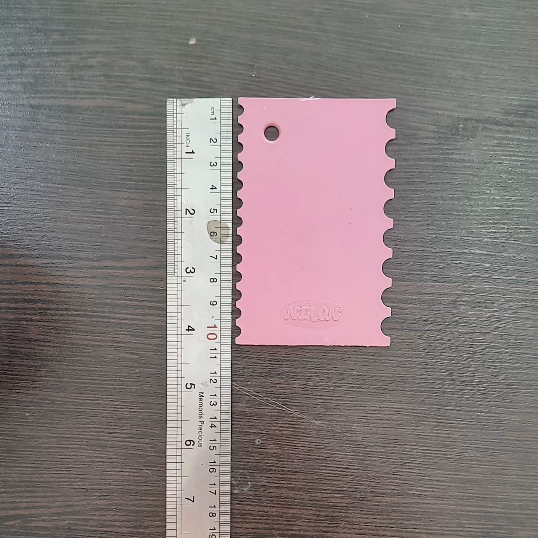 کاردک دندانه دار