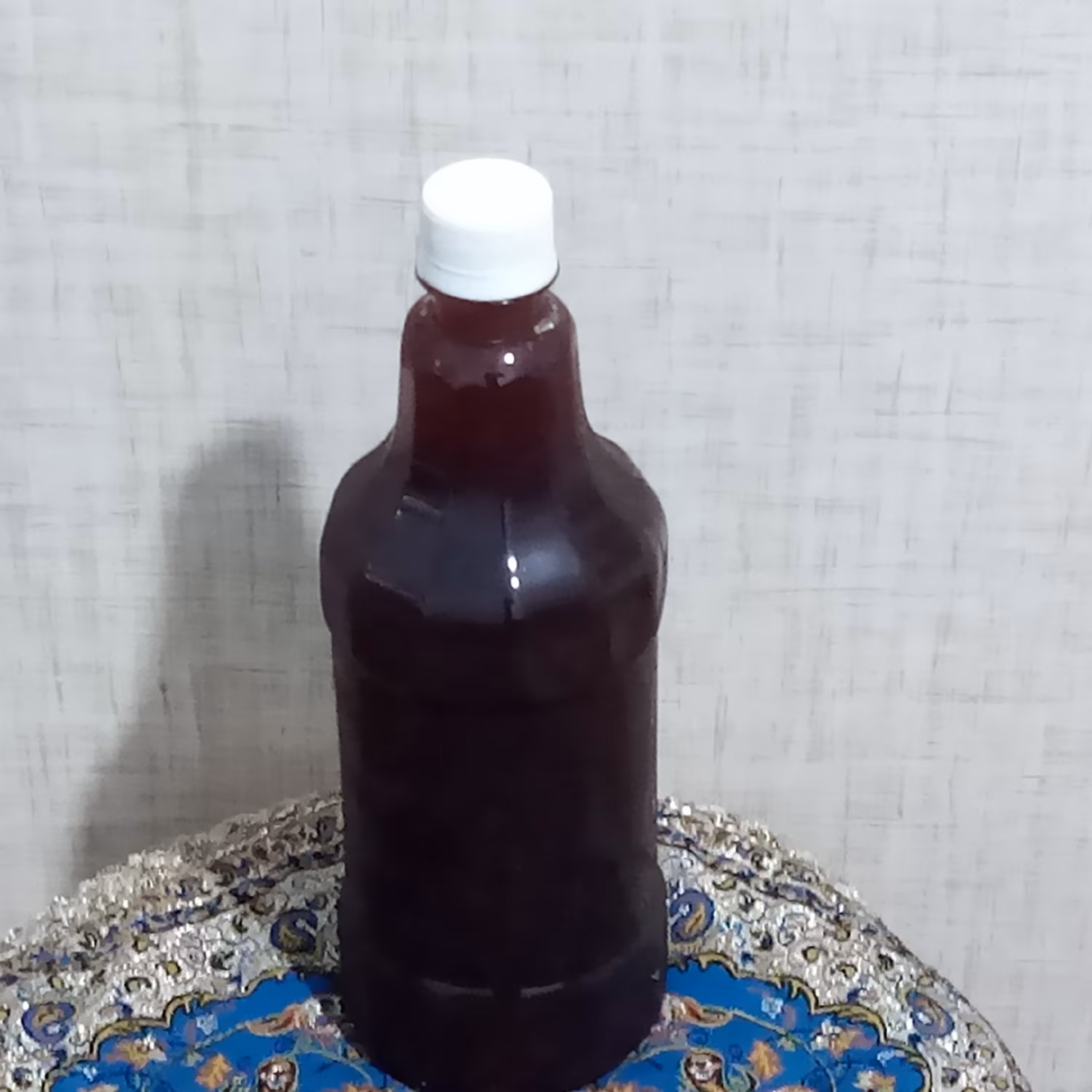 شیره طبیعی انگورعسگری  خوشرنگ درجه 1(900گرمی)
