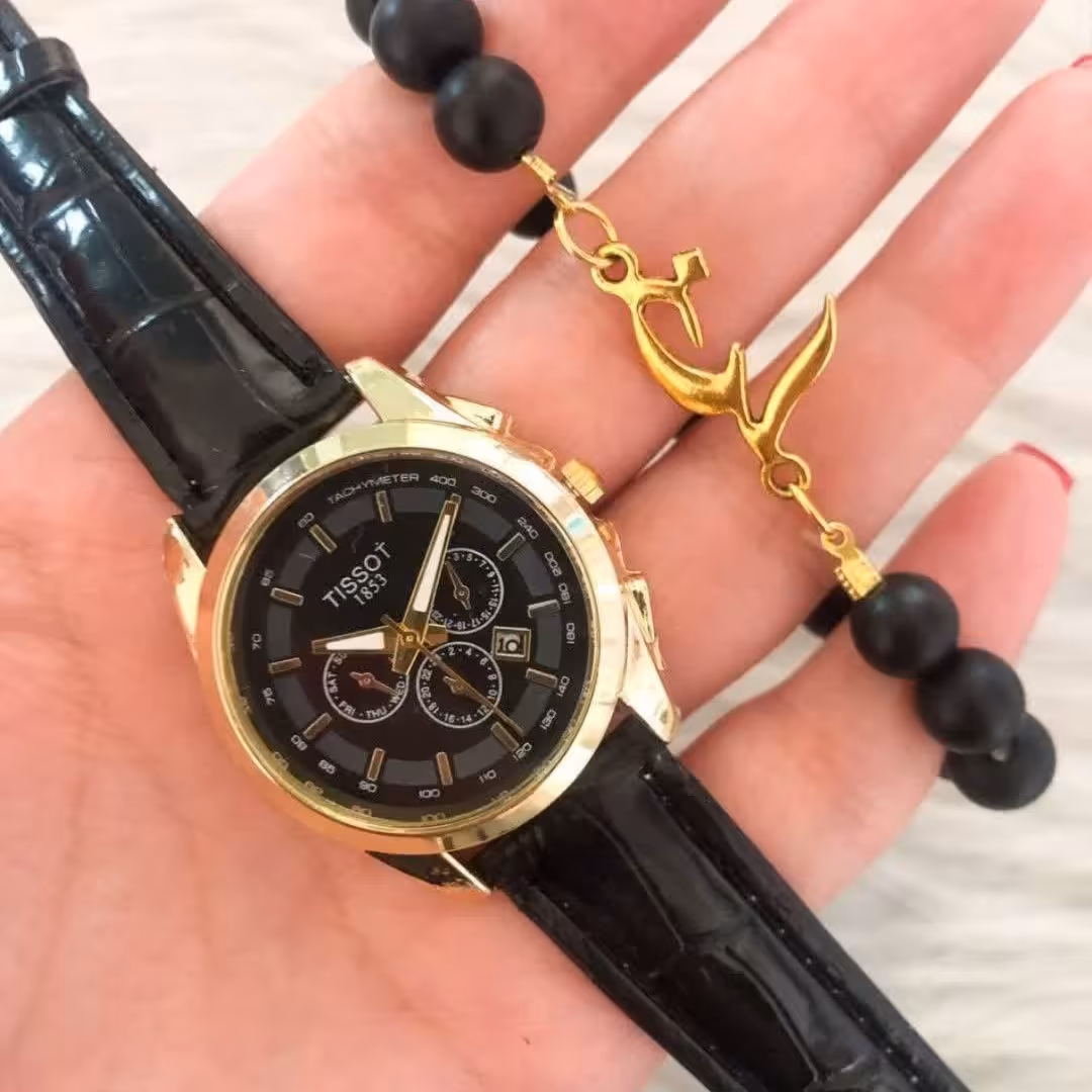 ست ساعت زنانه بند چرم مشکی صفحه مشکی مارک تیسوت همراه دستبند مهره مشکی 