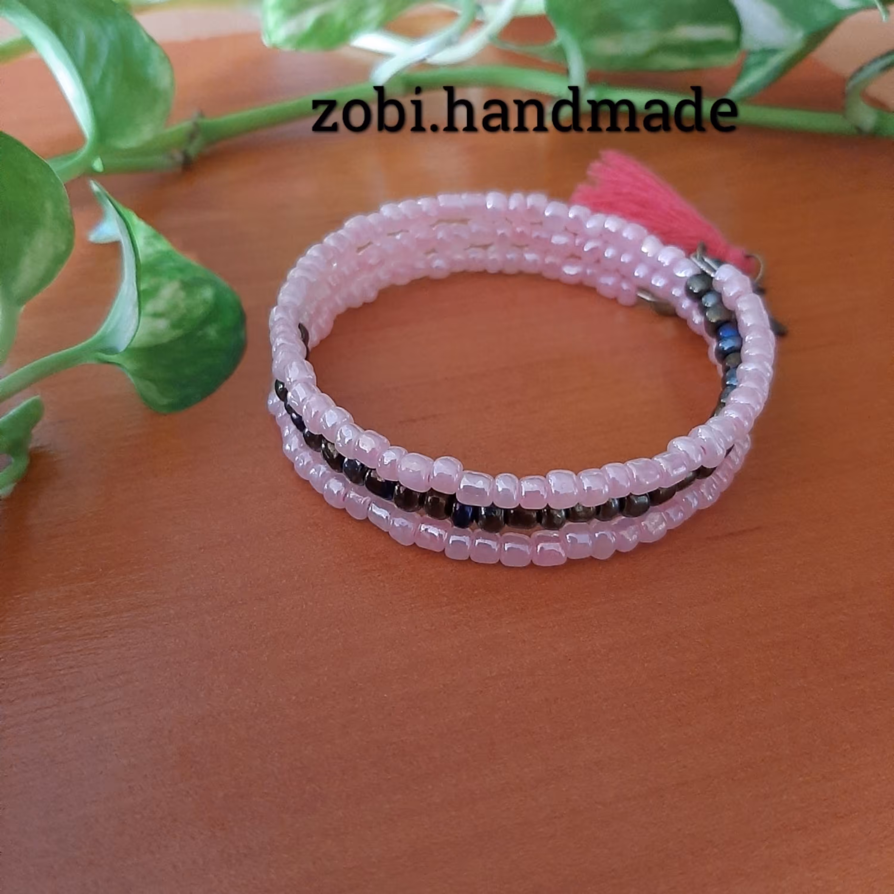 دستبند منجوق صورتی دورپیچ