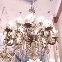 لوستر برنجی دو گل بزرگ 8 شاخه 16 شعله پرداختی کد 6007 ( لوستر برنزی)