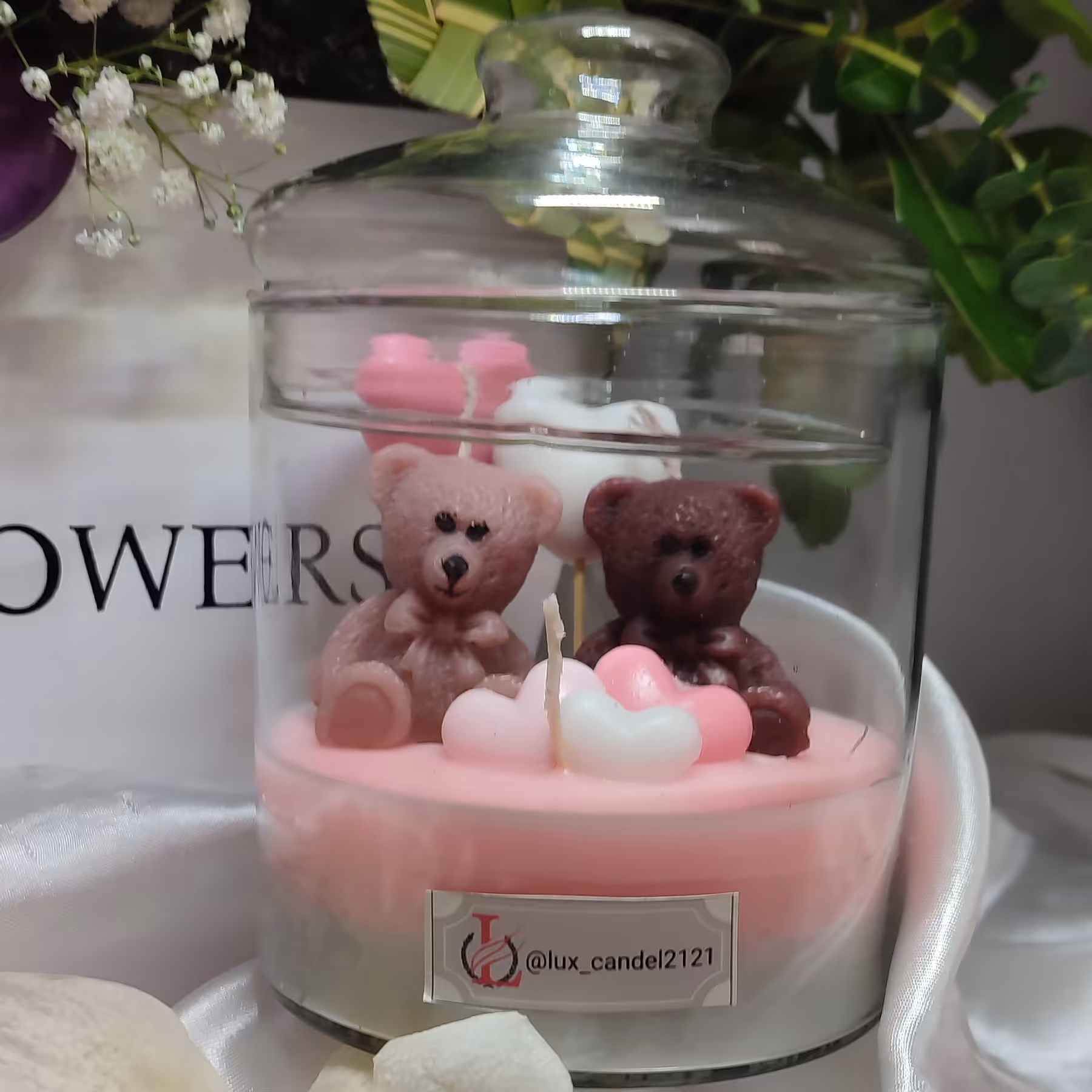 شمع تدی داخل استوانه شیشه ایی بزرگ 