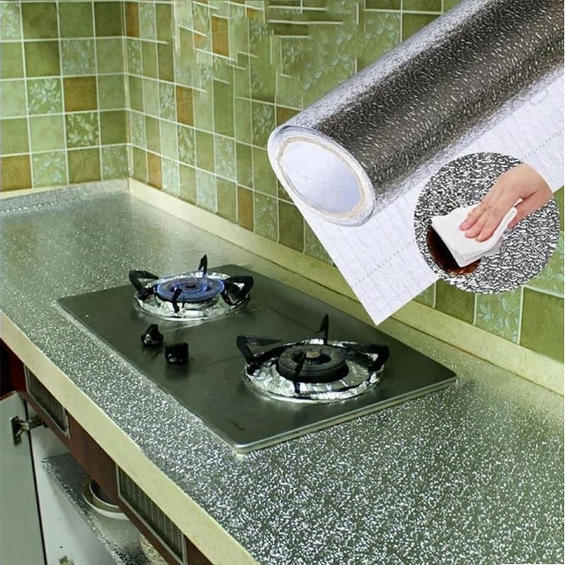فویل چسبی رولی نسوز روکش کابینت  رنگ نقره ای 5 متری در عرض 60 مناسب برای داخل کابینت یخچال سرویس آشپزخانه 