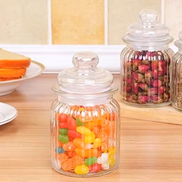 ظرف یا بانکه شیشه ای تنقلات و ادویه  سایز 2   در ابعاد 19در 11

