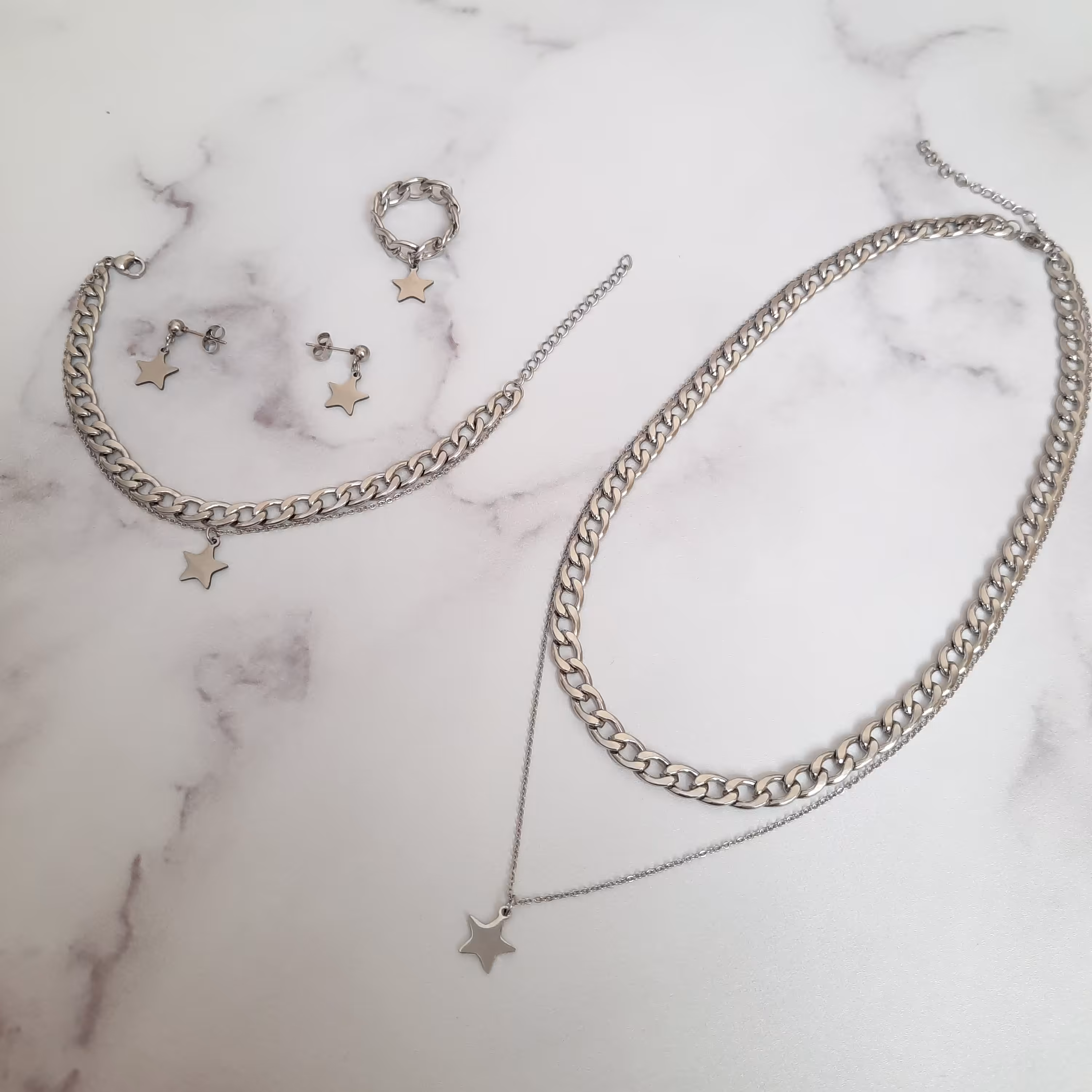 ست گردنبند دستبند گوشواره انگشتر کارتیر استیل 