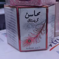 عطر عربی جامد جیبی محاسن کریستال با رایحه ای خوشبو و خاطره انگیز 