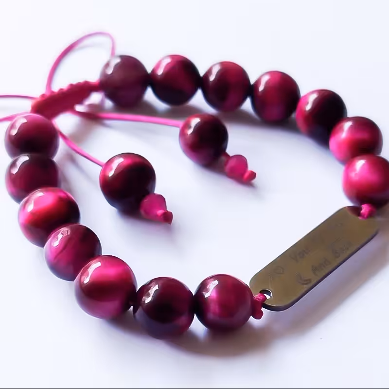 دستبند مدل عشق جاودانه با سنگ های چشم گربه و پلاک استی مناسب برای همه