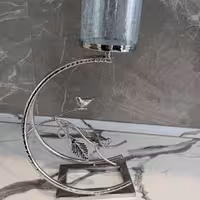 شمعدان مدل نیمگرد نقره ایی                