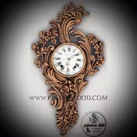 ساعت دیواری  چوبی  رونیک ، منبت دست ، ابعاد 100 سانتیمتر  طول در 55 سانتیمتر عرض  و ضخامت 9 سانتیمتر