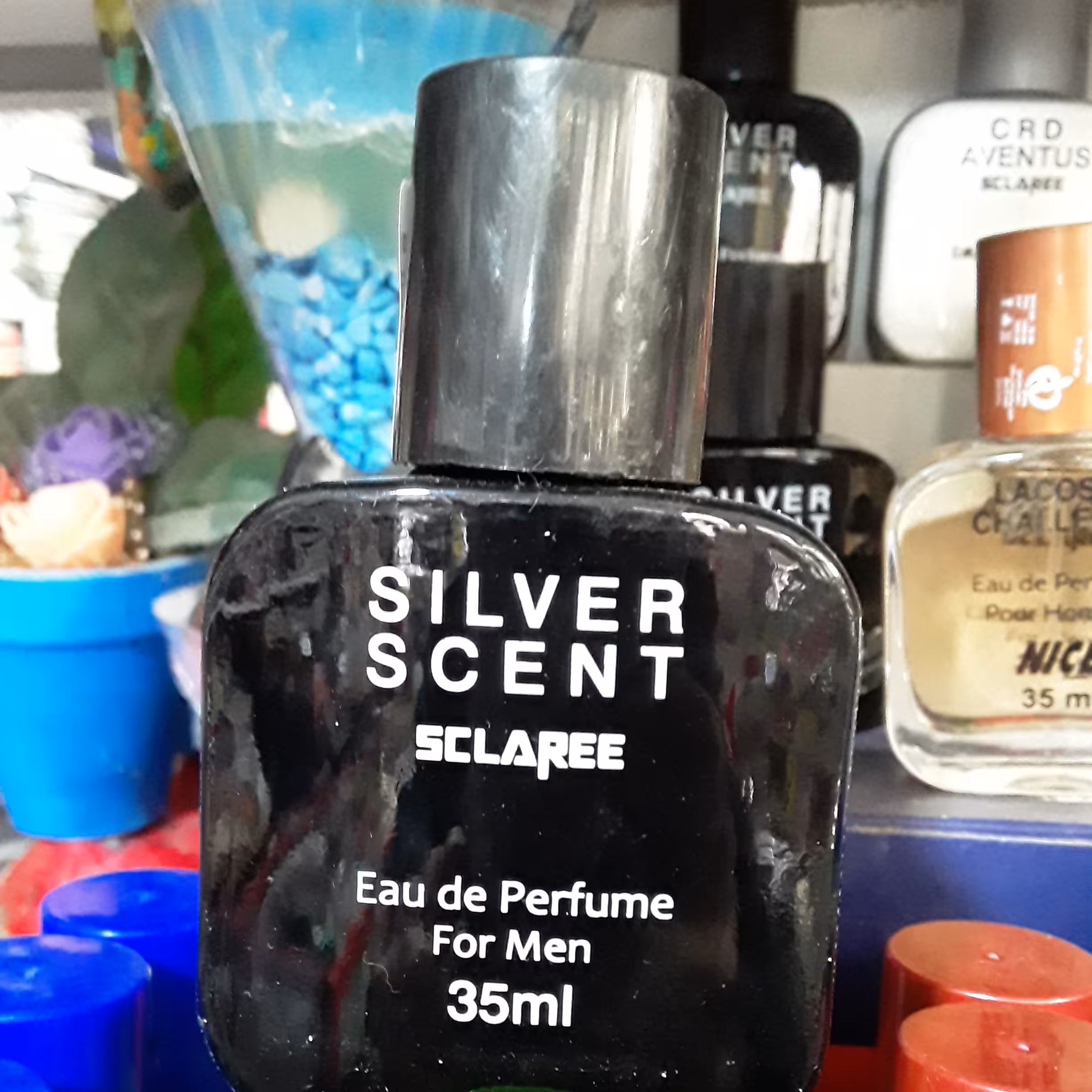 عطر مردانه ی 35 میل  سیلورسنت  از شرکت اسکلاره با ماندگاری بالا