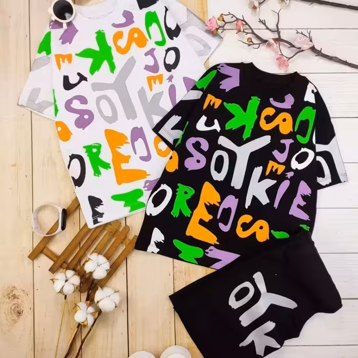 ست اسپورت تیشرت و شلوارک جنس نخ پنبه درجه یک دو رنگ سفید و مشکی مناسب 3 تا 11 سال 