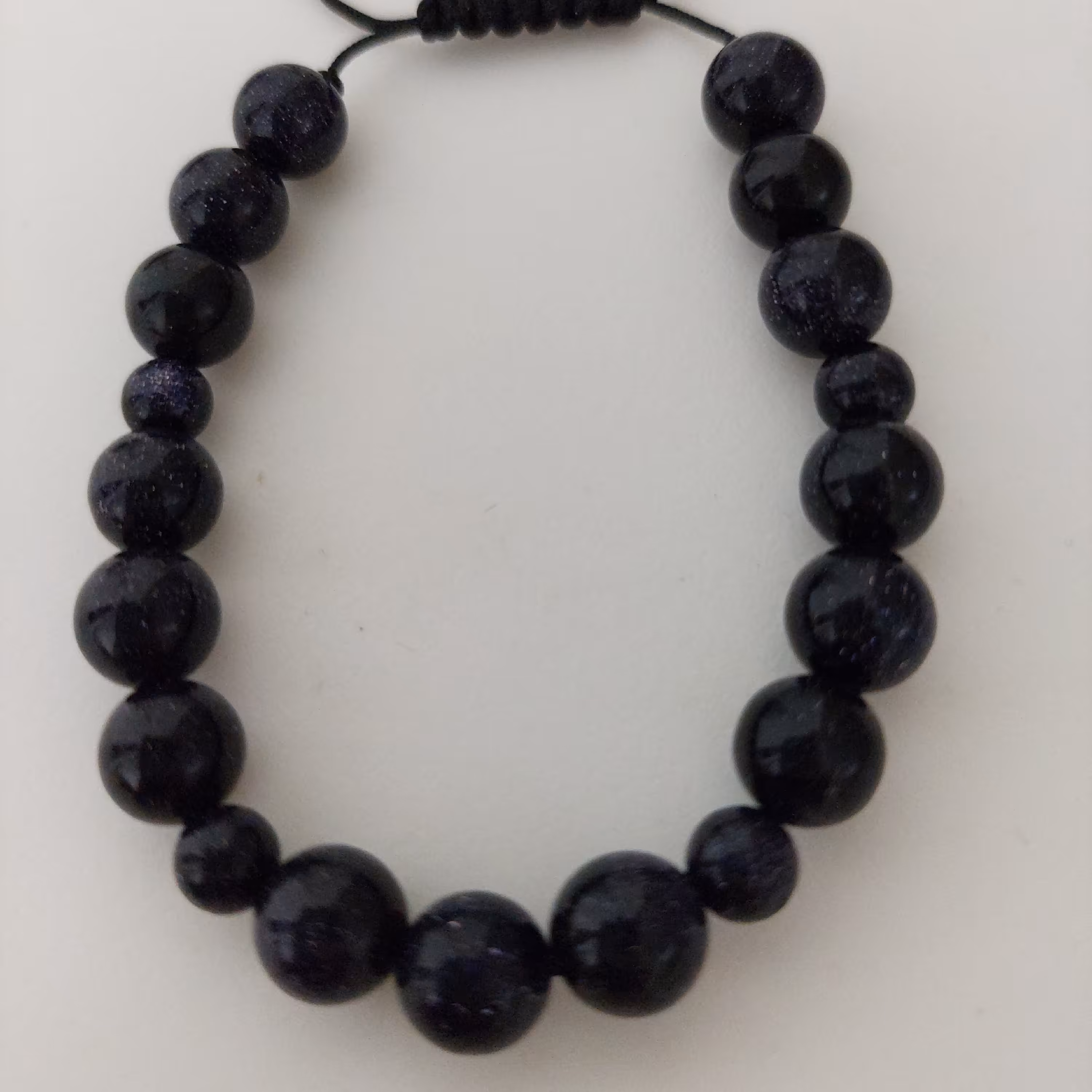 دستبند سنگ سورمه ایی تیره دلربا