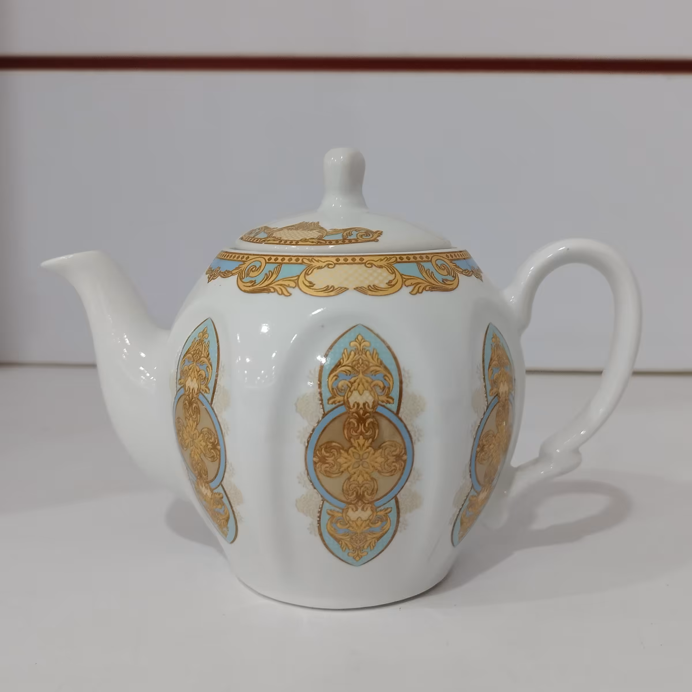 قوری چینی طرح ونچی ماریلا فیروزه ای سایز کوچک