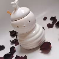 عسل خوری سرامیکی سفید زنبوری دارای در