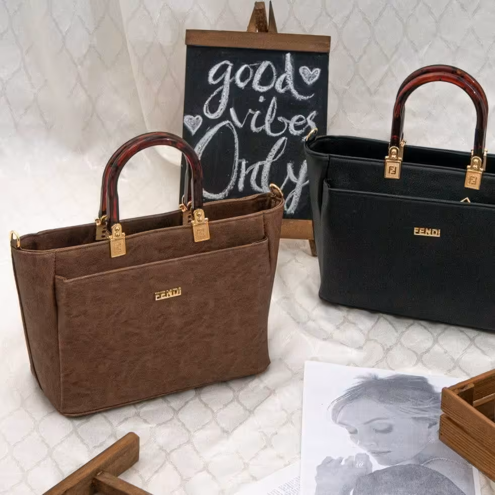 کیف دسته دار مجلسی شیک وخوشگل زنانه همراه بند دوشی با تنوع رنگ های زیبا وجذاب 