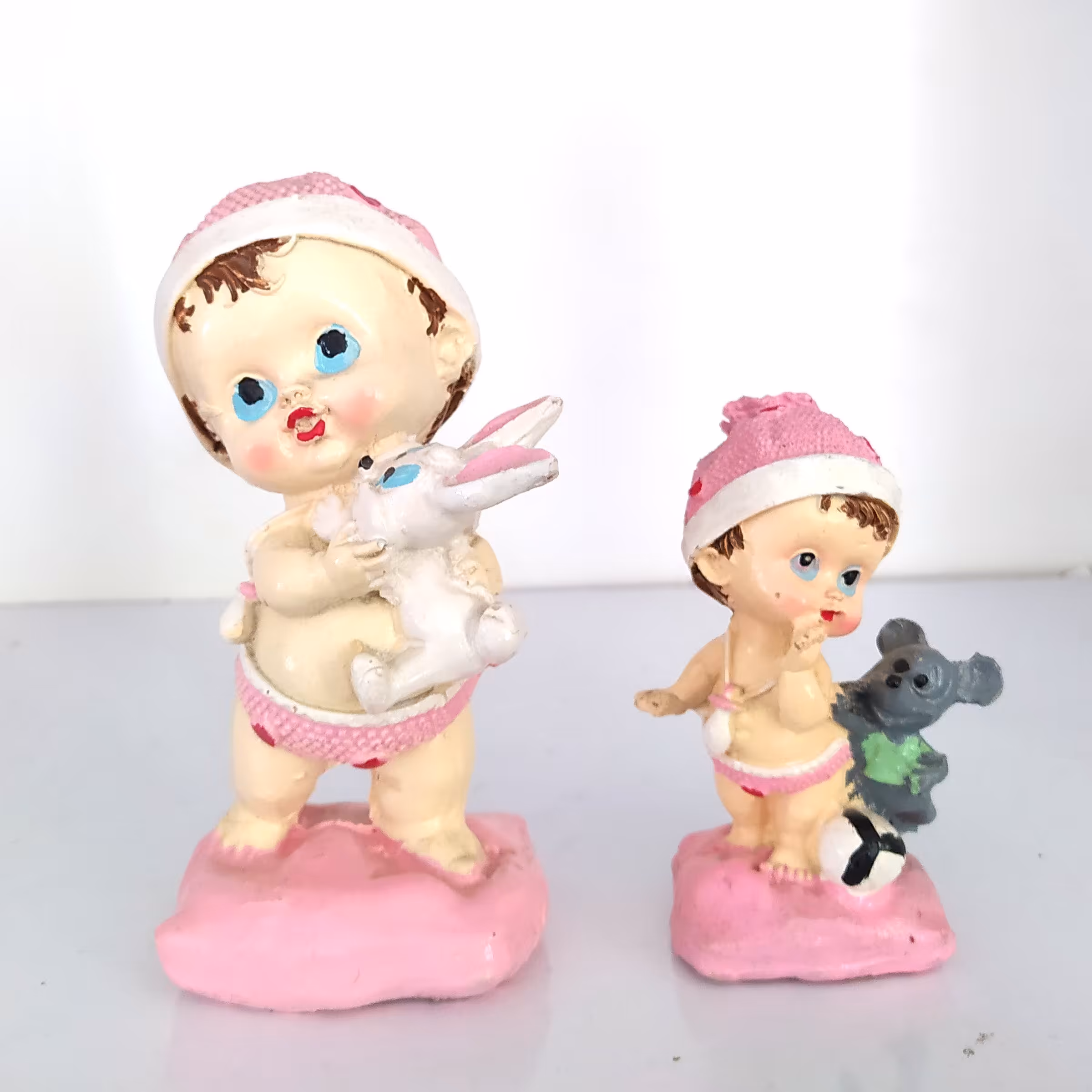 مجسمه دکوری نی نی جفتی صورتی