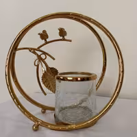 شمعدان مدل گرد پرنده طلایی                      