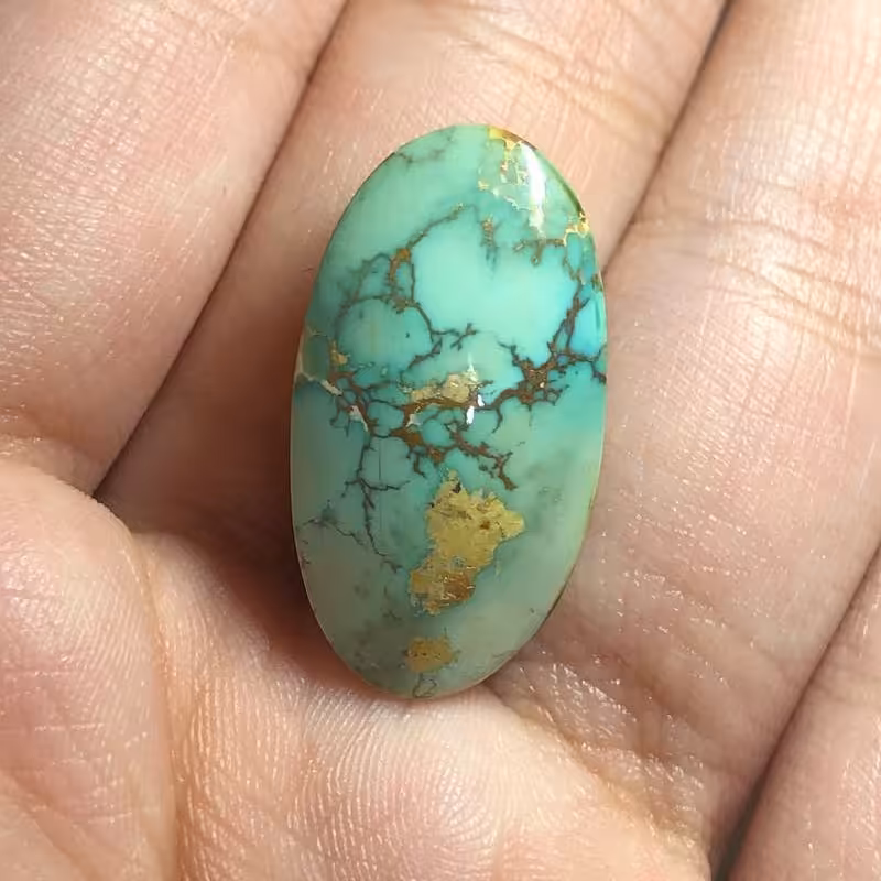 نگین فیروزه نیشابوری عنکبوتی کاملا طبیعی با تراش  بیضی شکل  بسیار زیبا و محشر  کد 99