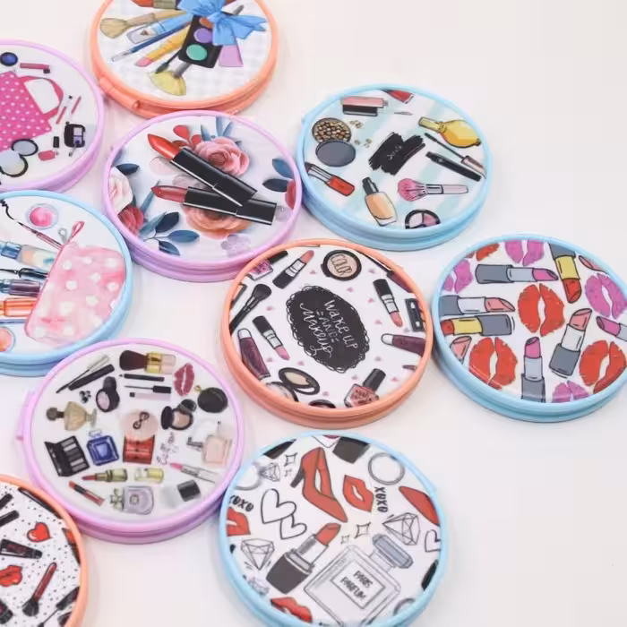 آینه  کیفی گرد طرح لوازم آرایشی