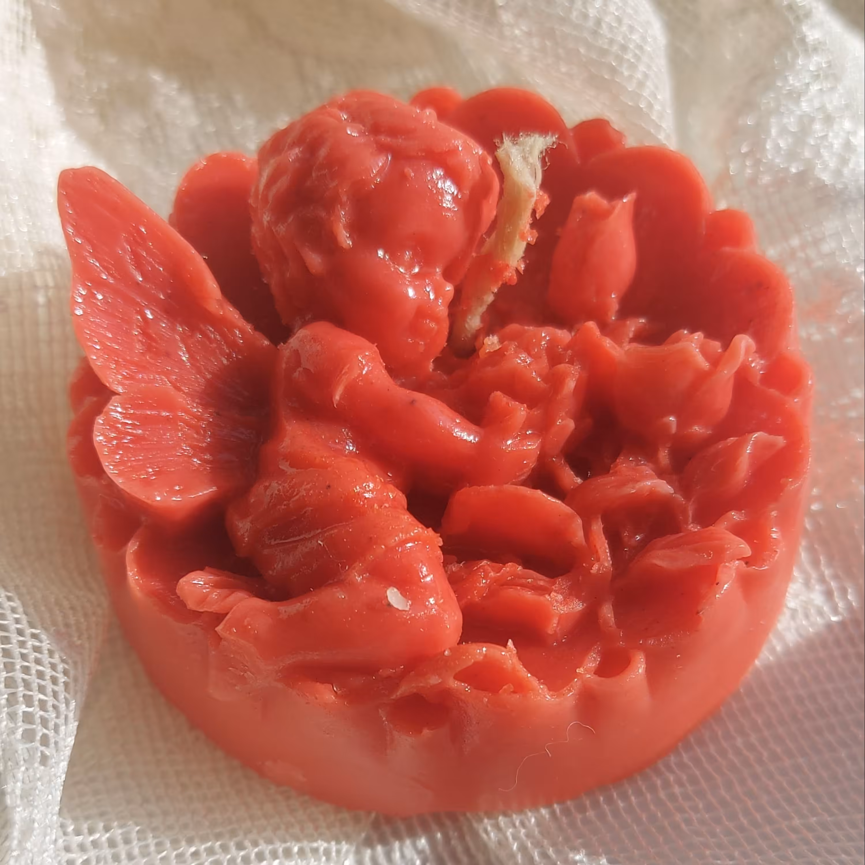 شمع تزیینی فرشته کودک گل به دست 