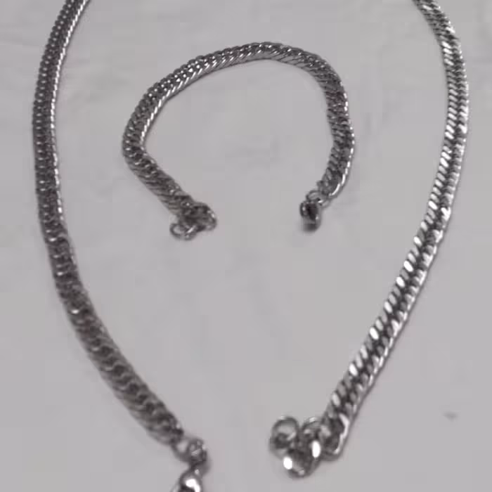 گردنبند ودستبند کارتیر  (استیل) 