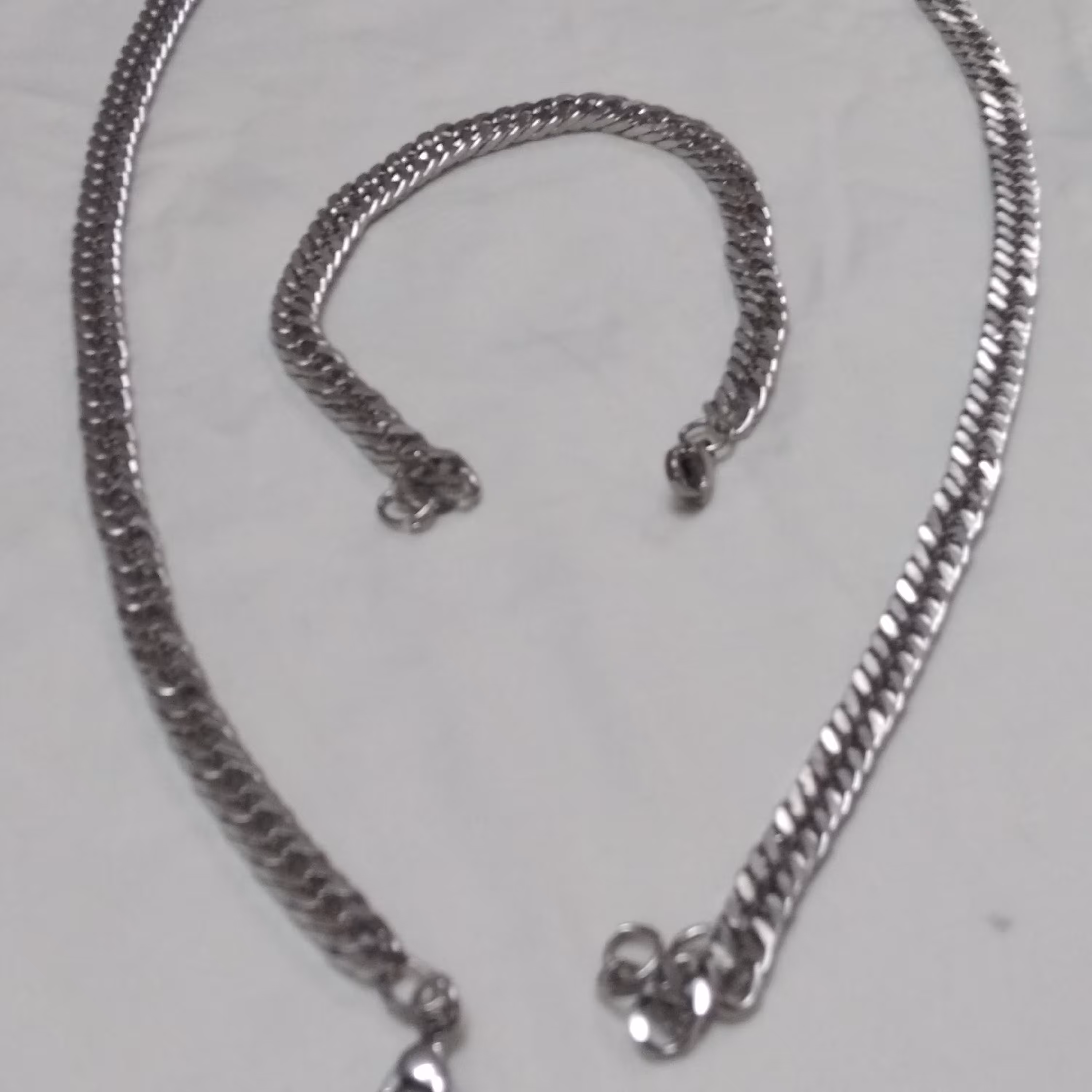 گردنبند ودستبند کارتیر  (استیل) 