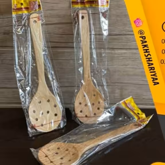 کفگیر چوبی سوراخ دار دسته بلند .