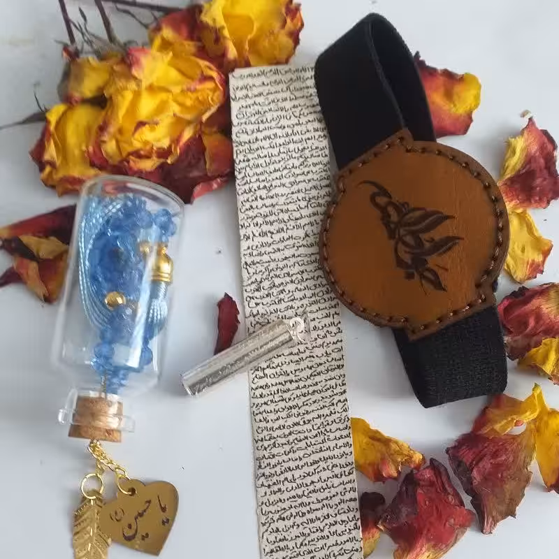 حرز کبیر آقا امام جواد(ع) دست نویس بر روی پوست آهو به همراه بازوبند و لول نقره