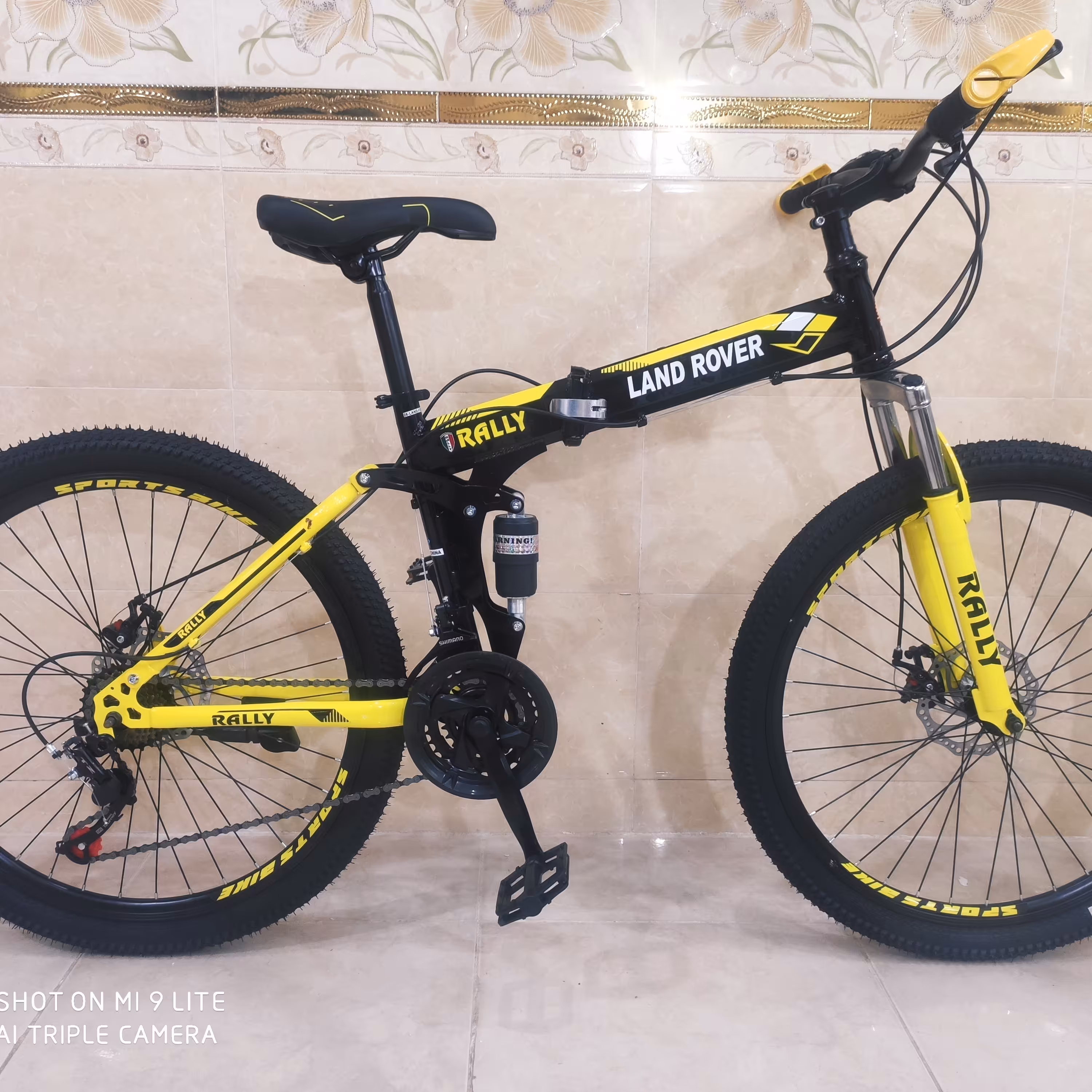 دوچرخه تاشو سایز 26 ،24 و 27  لندرور LAND ROVER رنگ مشکی زرد شرکت RALLY 