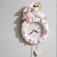 ساعت دیواری اتاق کودک طرح خرس نانان مدل دخترانه