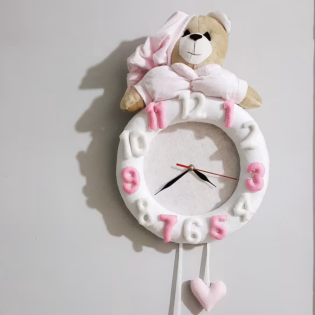 ساعت دیواری اتاق کودک طرح خرس نانان مدل دخترانه