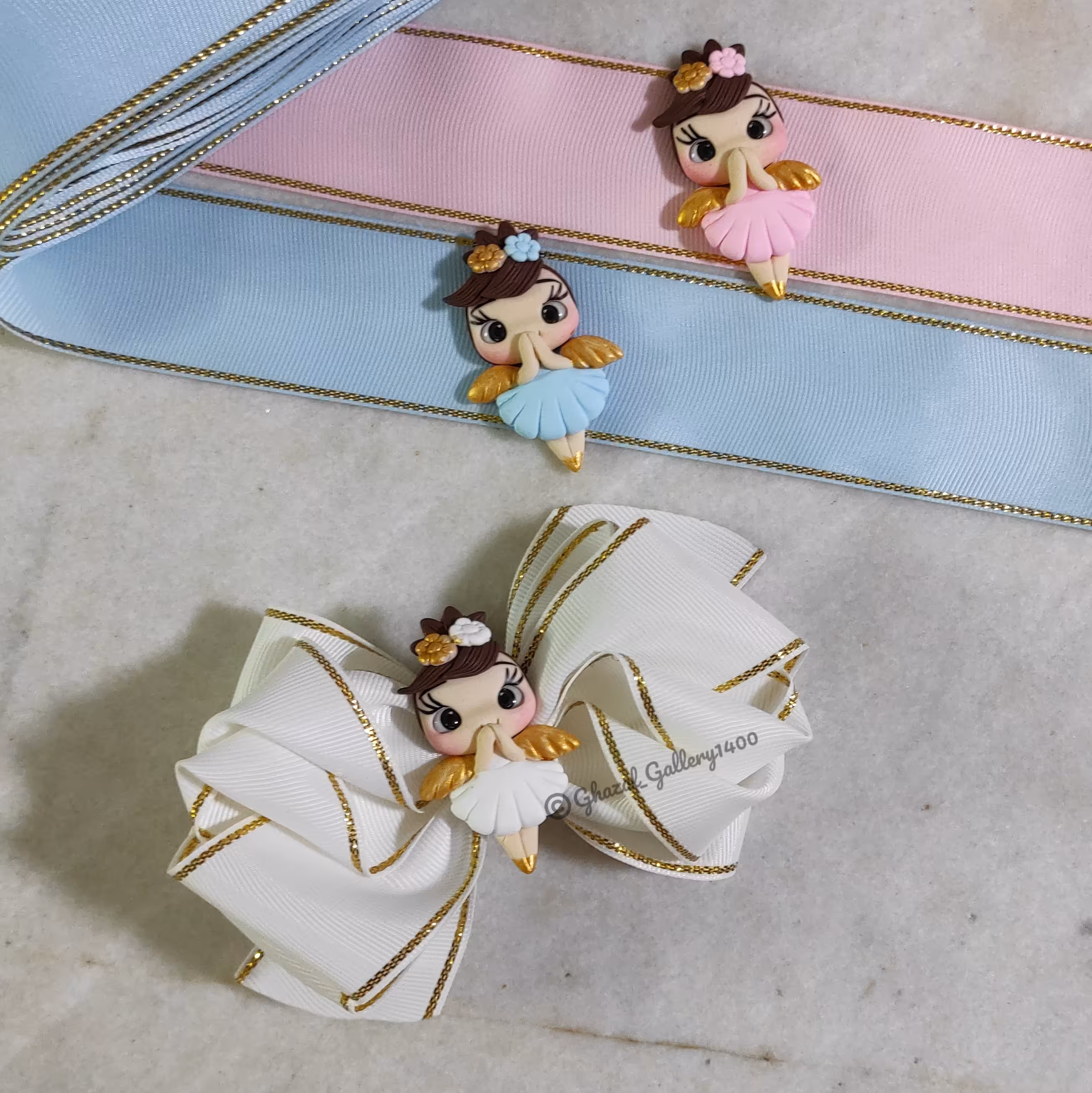 هدبند پاپیون بزرگ سفید طلایی و آبی طلایی و صورتی طلایی با  پیکسل فرشته