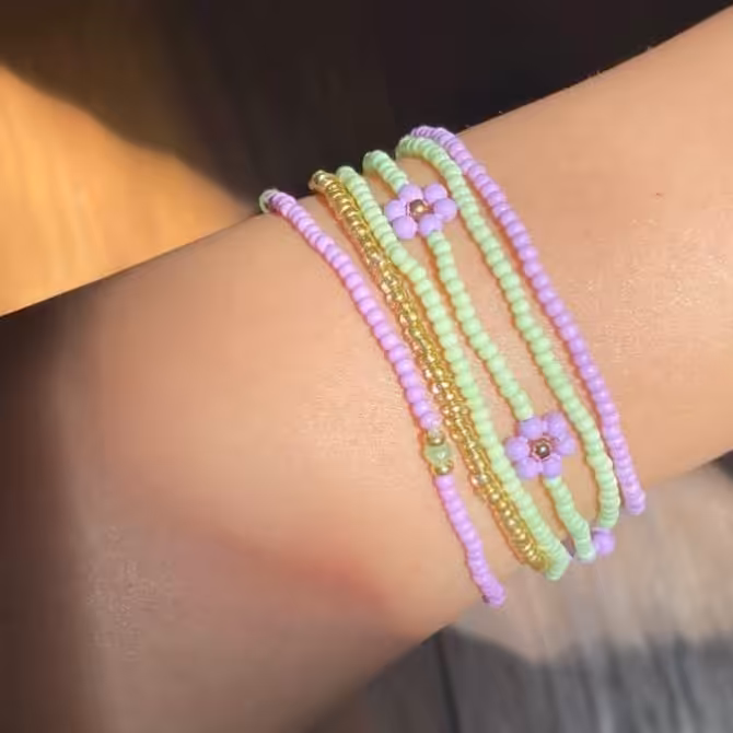 پک دستبند 6 عددی دستبند بابونه دستبند منجوق دستبند کشی