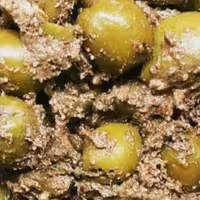 زیتون پرورده با رب انار ملس و گردو